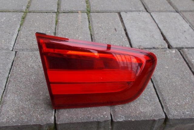 Задняя левая внутренняя фара F03603000 BMW
