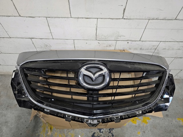 MAZDA TK2150710D50 Решетка радиатора в наличии Николаев