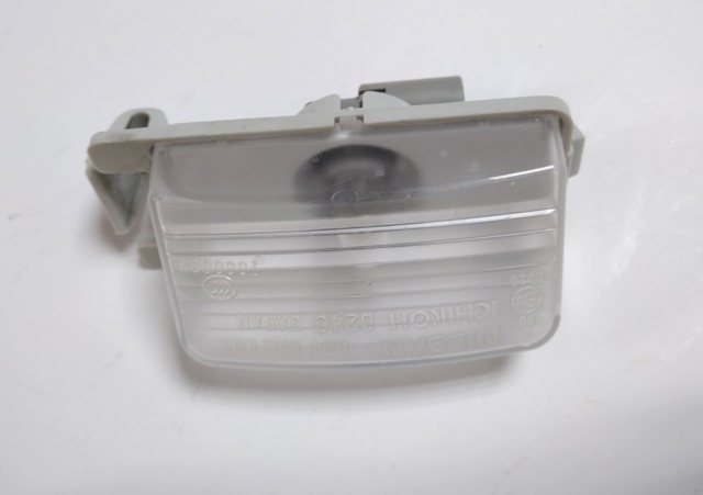 Фонарь освещения номерного знака 26510CD00A NISSAN