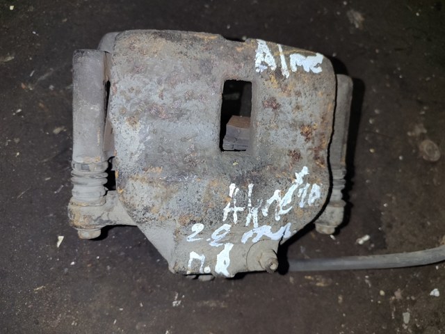 Суппорт тормозной, передний, правый 410012F522 NISSAN