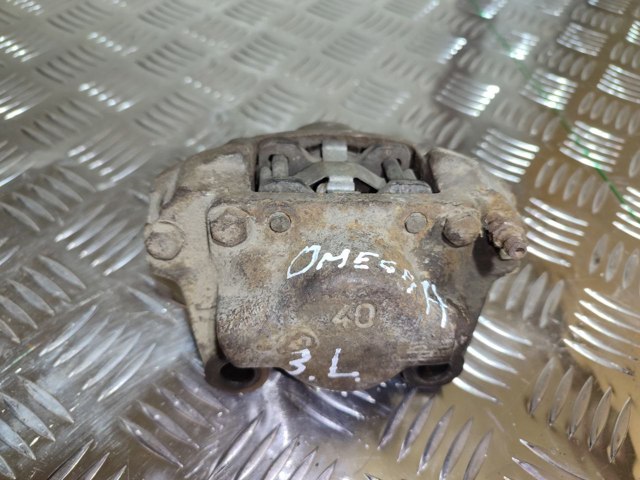 Тормозной суппорт правый задний Opel Omega A