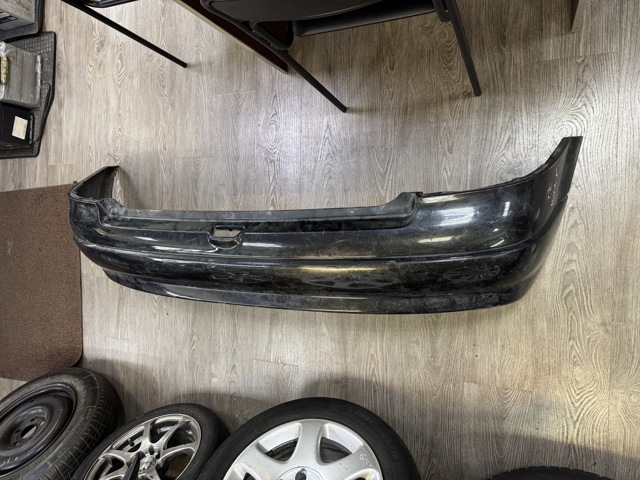 Задний бампер 90559515 OPEL