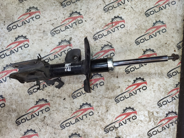 Стойка передняя левая E43033NA0C NISSAN