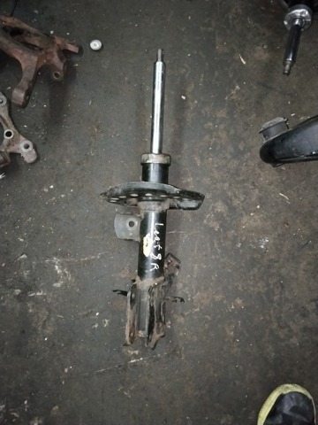 Стойка передняя правая E4C023NL0A NISSAN
