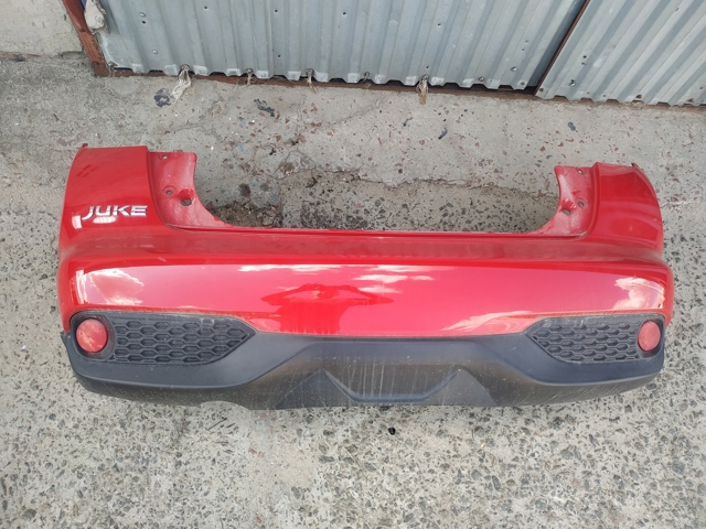 Бампер задний 850223YM0H NISSAN