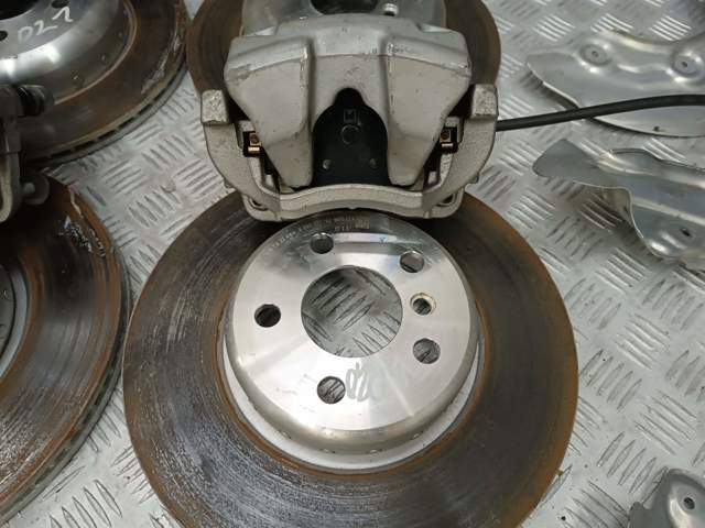 Суппорт тормозной передний левый 34106882253 BMW
