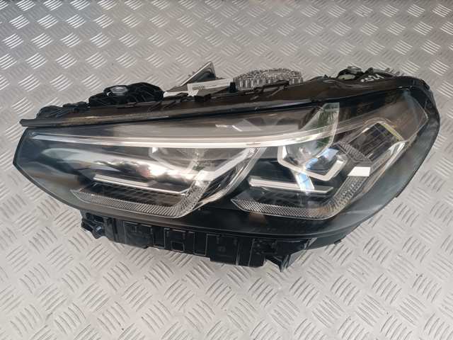 Фара левая передняя 63115A0E5F5 BMW