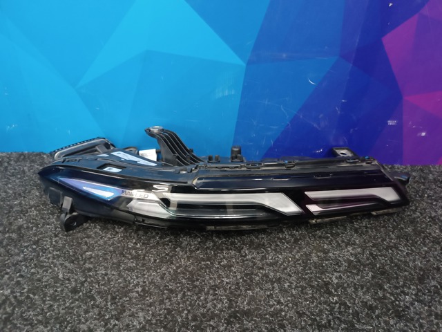 Вставка фары правой 9880594 BMW
