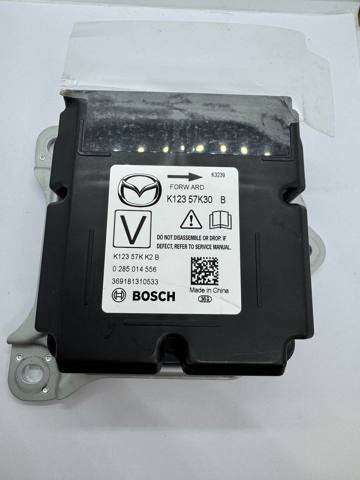 Модуль-процессор управления подушкой безопасности (ЭБУ AIRBAG) K12357K30B MAZDA