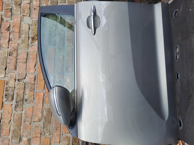 Водительская дверь 760033W000 HYUNDAI