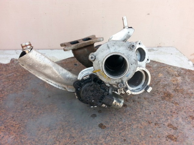 Турбоком 06K145874L VAG