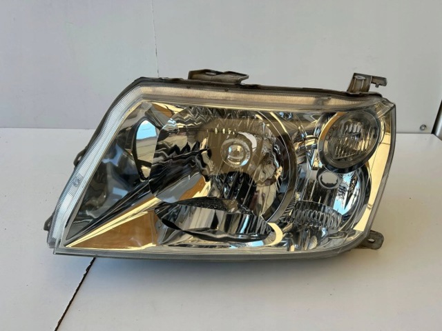 Блок фара левая 10059076 SUZUKI
