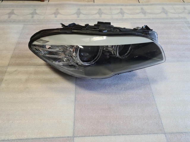 Фара правая 720324012 BMW