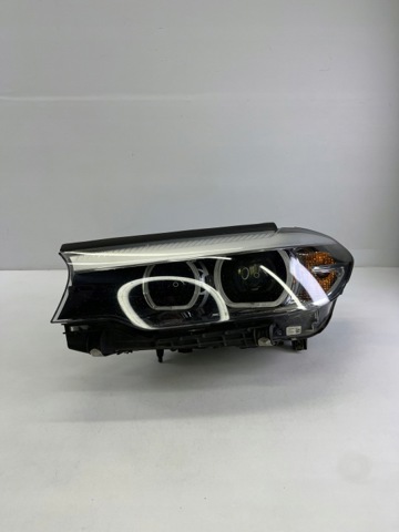 Фара левая передняя 7214953 BMW