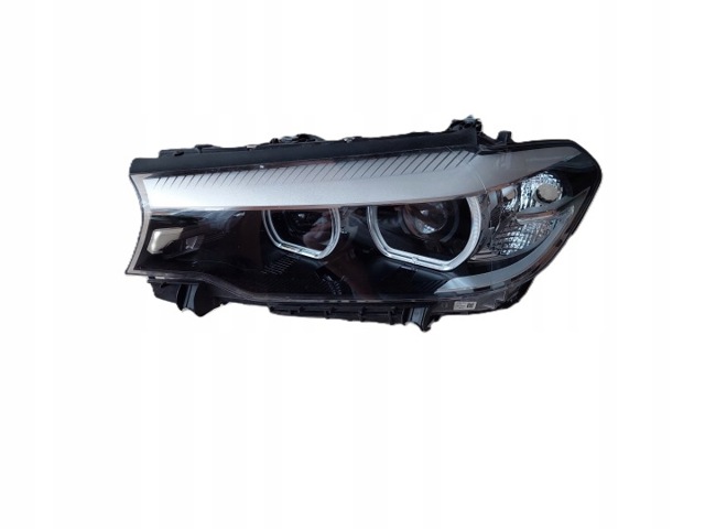 Фара левая 7214955 BMW
