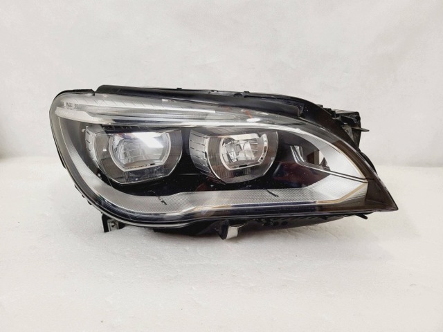 Фара основная правая 7348496 BMW