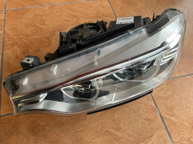 Блок фара левая 7377855 BMW