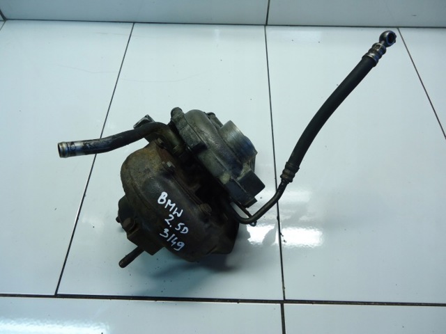 Турбокомпрессор 7791709 BMW
