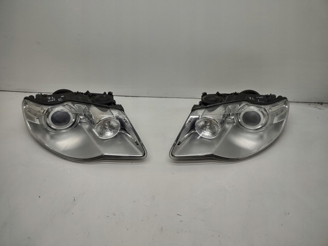 Основная фара в сборе левая 7L6941031C VAG