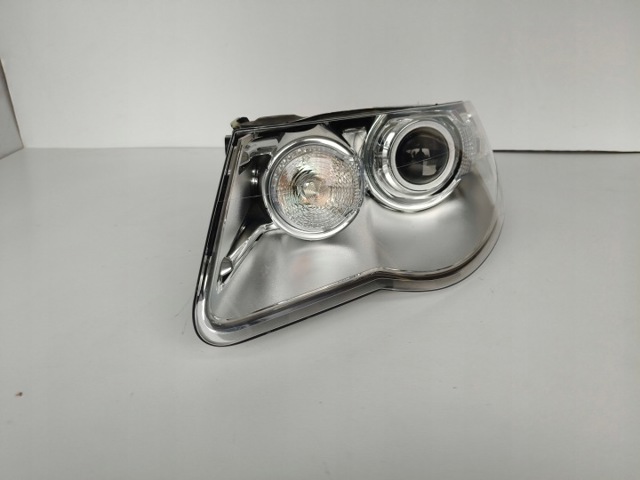 Вставка фары левой 7L6941039C VAG