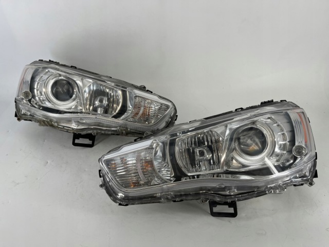 Блок фара левая 8301C411 MITSUBISHI