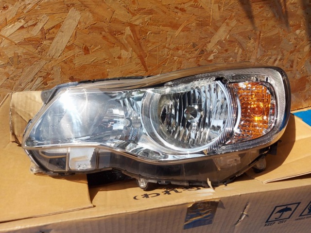 Основная фара в сборе левая 84001FJ190 SUBARU