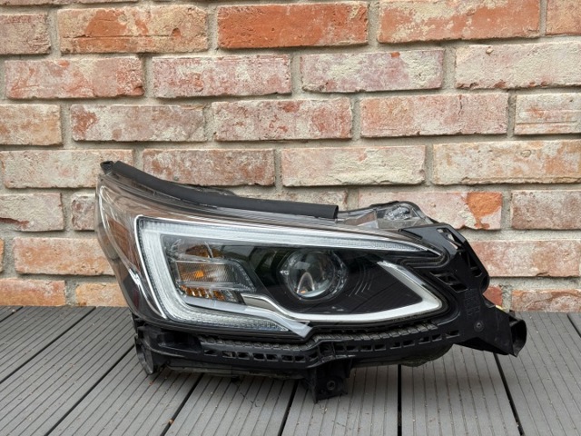 Основная фара - вставка 84002AN10A SUBARU