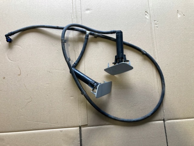 Держатель форсунки омывателя фары 8V0955101 VAG