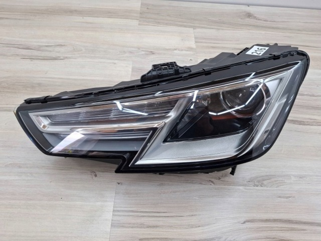 Основная фара в сборе левая 8W0941005B VAG