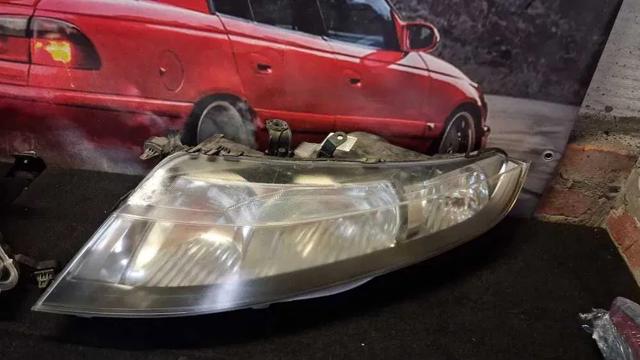 Основная фара в сборе левая 33151SMGE01 HONDA
