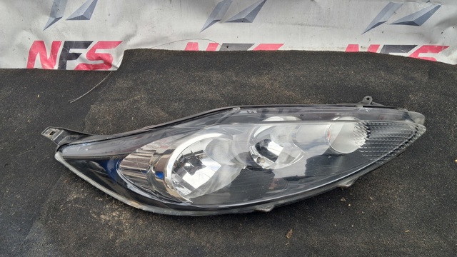 Вставка фары правой 8A6113W029AH FORD