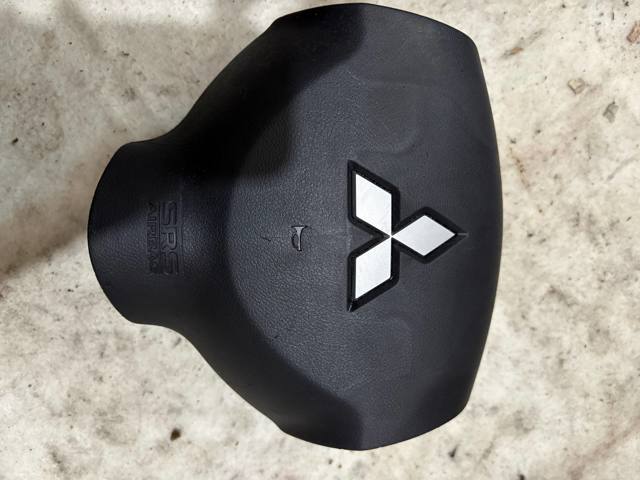 Подушка в руле 7030A088XA MITSUBISHI