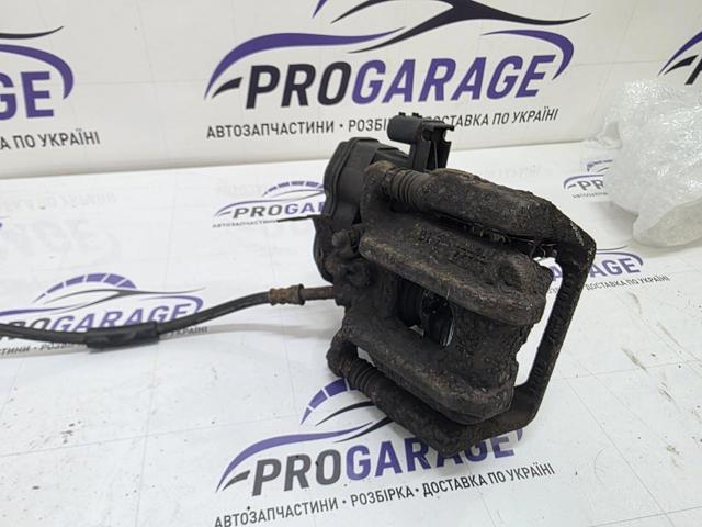 34216793042 BMW Суппорт задний правый купить в Николаев