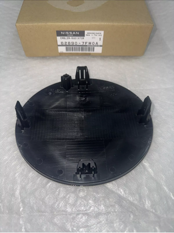 628907FW0A NISSAN Эмблема решетки радиатора купить в Киев