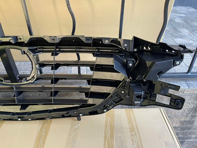 Облицовка радиатора TK4950710J MAZDA