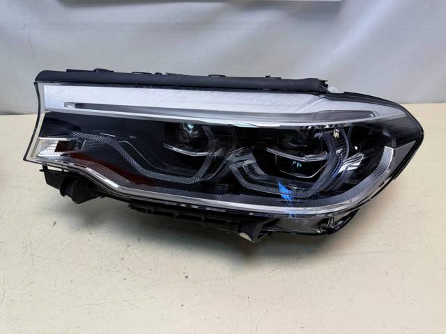 Блок фара левая 63117214953 BMW