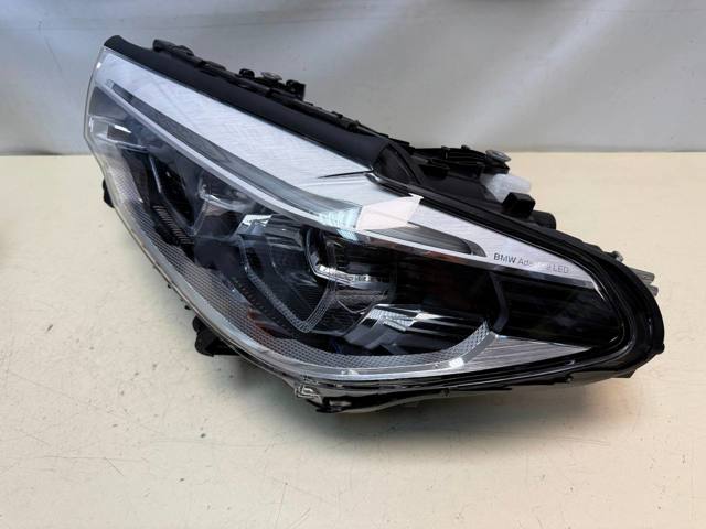 63117214957 BMW Фара левая купить в Украина