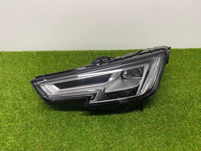 Вставка фары левой 8W0941773 VAG