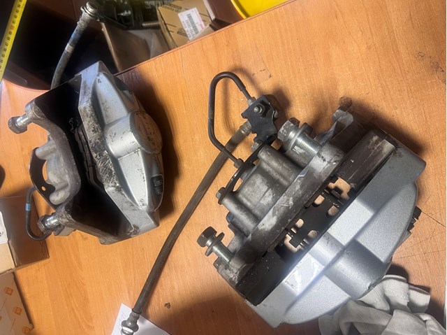 Тормозной суппорт задний левый 44011JL02A NISSAN