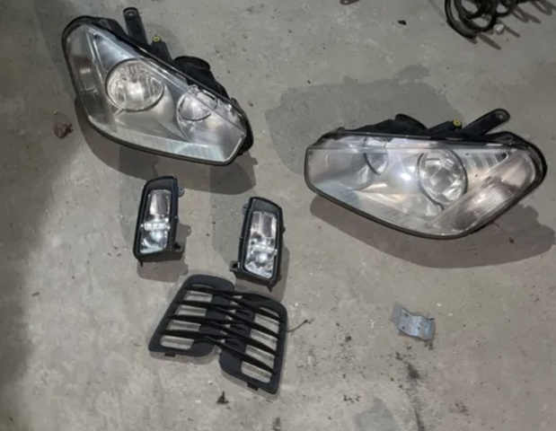 Фара левая 1707469 FORD