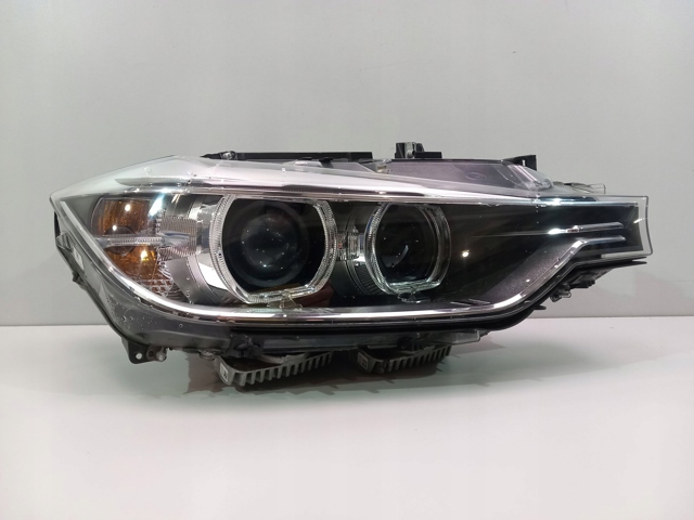 Основная фара - вставка 7338704 BMW