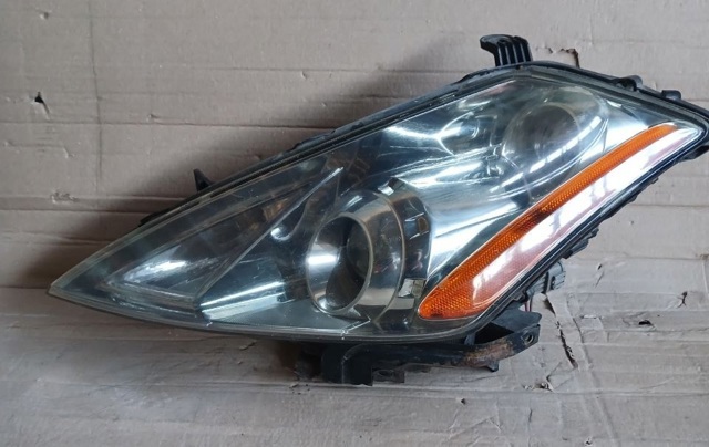Фара левая передняя 26060CB825 NISSAN