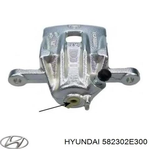 Тормозной суппорт правый задний 582302E300 HYUNDAI