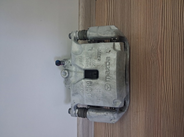 Супорт тормзной DGY93399Z MAZDA