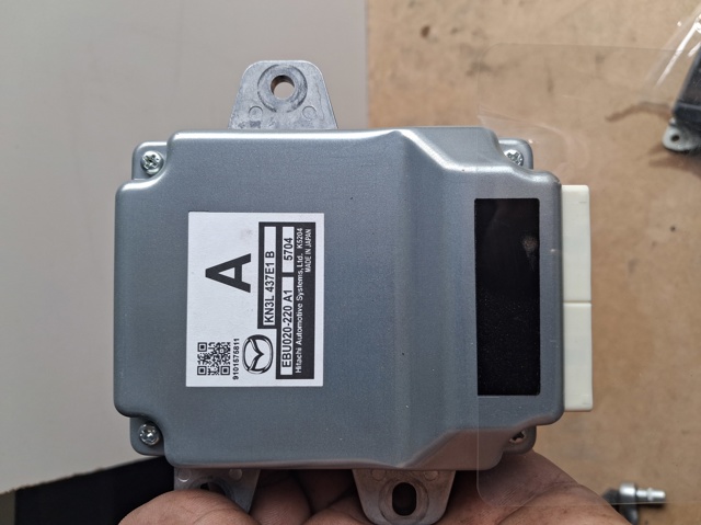 Блок управления электромеханического стояночного тормоза KN3L437E1B MAZDA