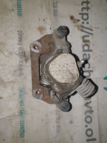 Тормозной суппорт задний левый Ford Focus III