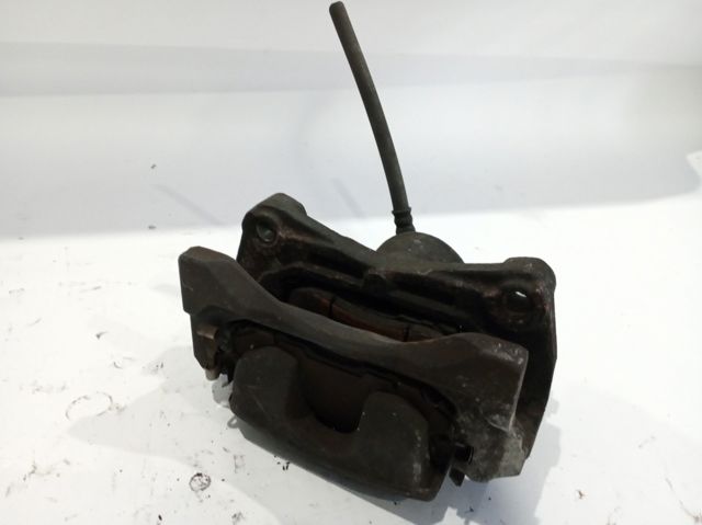 410111KC2C NISSAN Суппорт тормозной передний левый купить в Черкассы