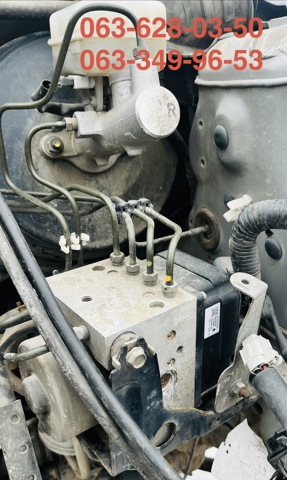 Блок управления ABS 476603Y566 NISSAN