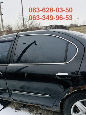 Стекло заднее левое 823012Y263 NISSAN