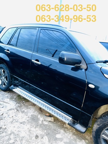 Стекло пассажирской двери 8450165J00 SUZUKI